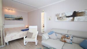 Wohnzimmer mit Bett
